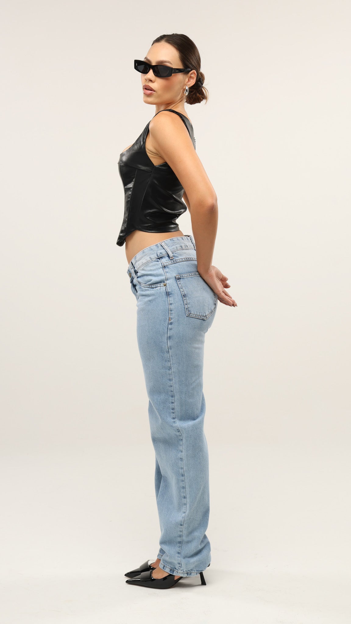 CALÇA JEANS ASSIMÉTRICA