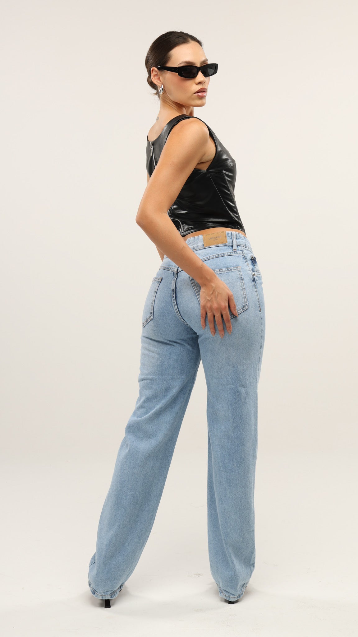 CALÇA JEANS ASSIMÉTRICA